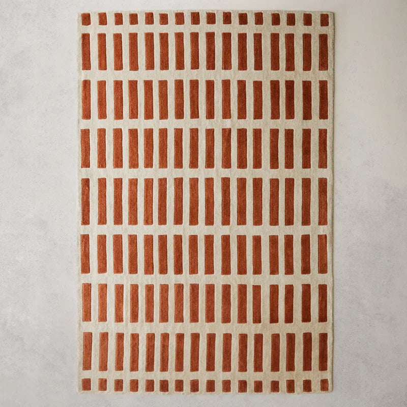 Pixelbar hand tufted wool carpet in beige & brick red