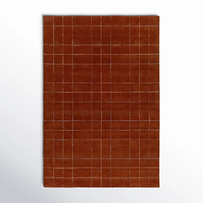 Outlinegrid hand tufted wool carpet in rust and ivory