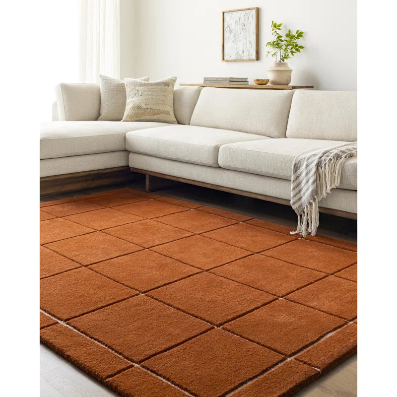 Framegrid hand tufted wool carpet in burnt orange