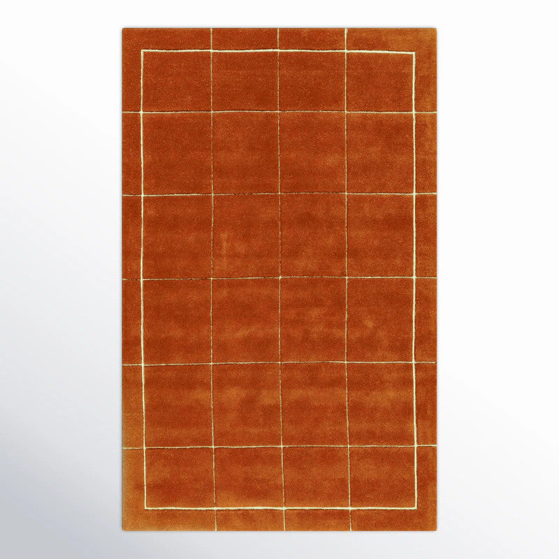 Framegrid hand tufted wool carpet in burnt orange