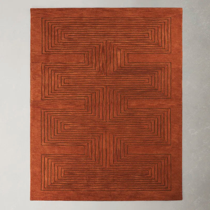 Labyrinth hand tufted wool carpet in terracotta