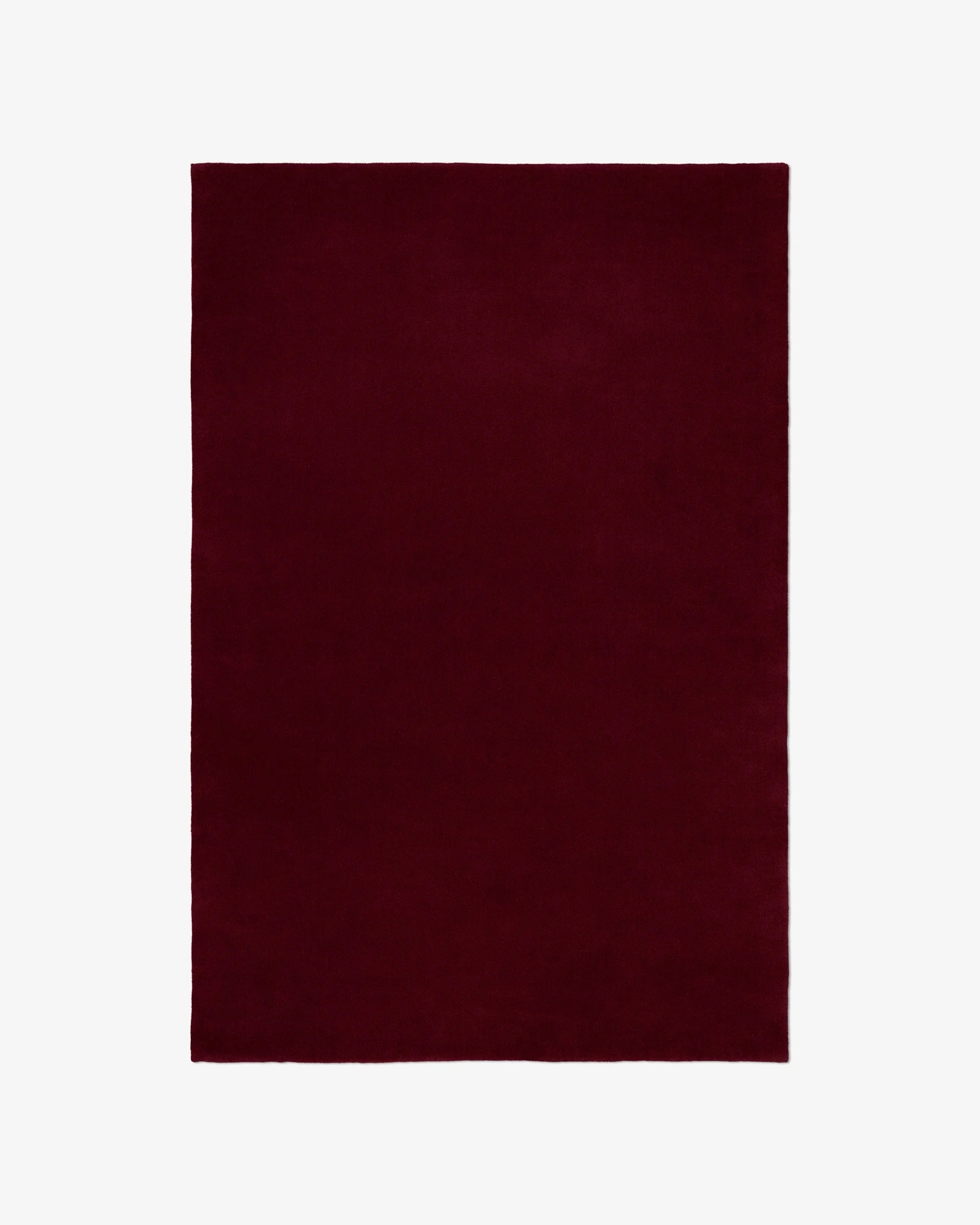 Dark Maroon Woolen Hand Tufted Carpet