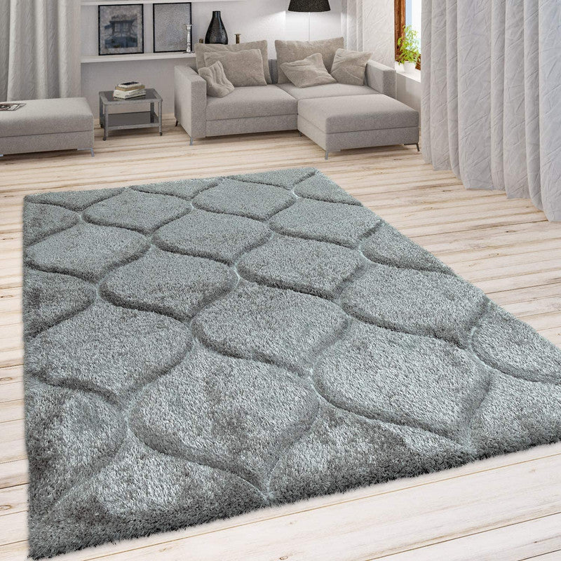 Gray stone-patterned rug on wooden floor