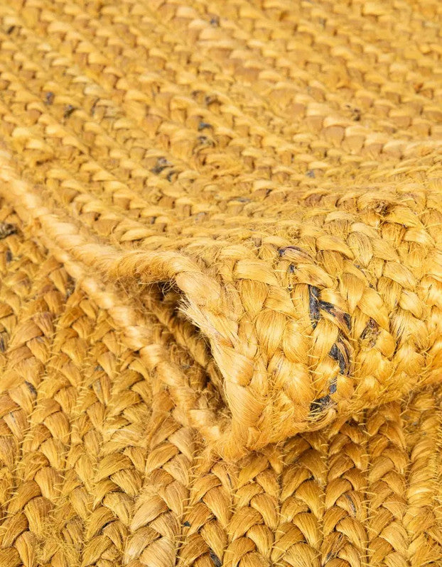 Close-up of a woven straw surface with visible texture and pattern.