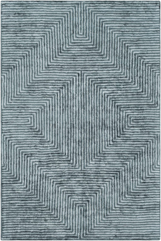 Rug with zigzag pattern in blue and gray