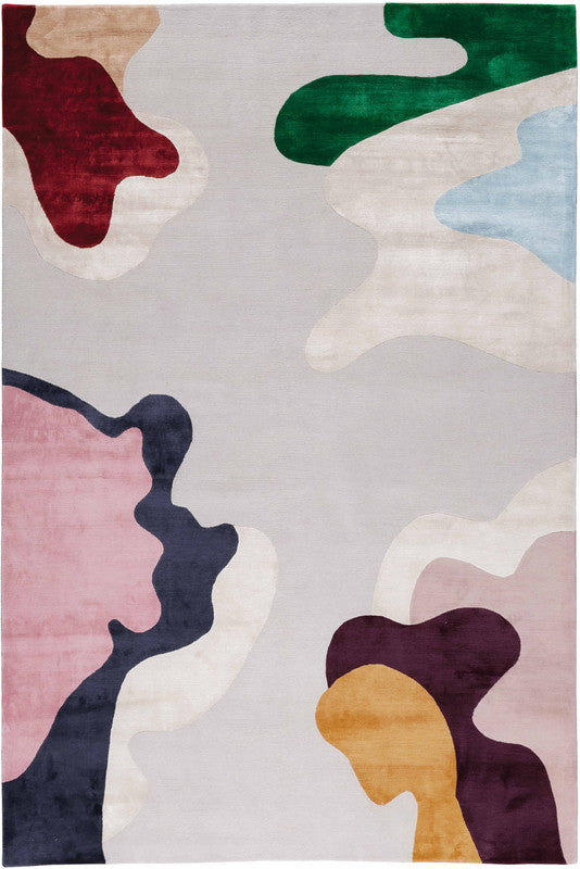 Multicolored abstract rug on a gray background