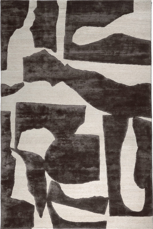 Abstract rug with black and gray geometric shapes on a light background