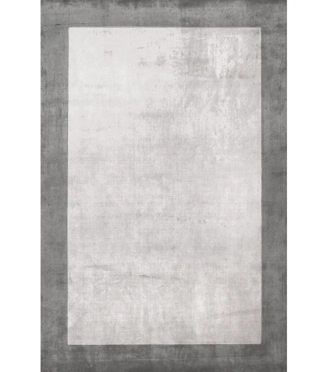 Rectangular area rug with a gradient design from gray to white.